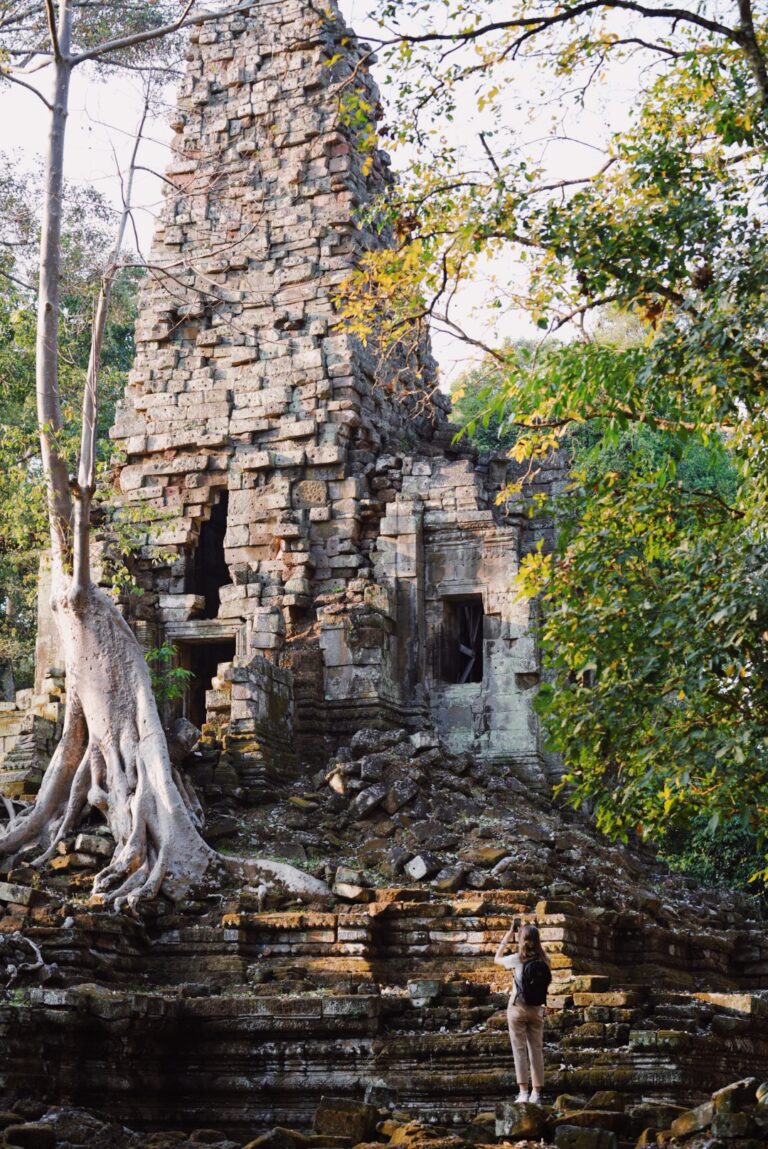 Woman views temples of Angkor on the Banana Pancake Trail