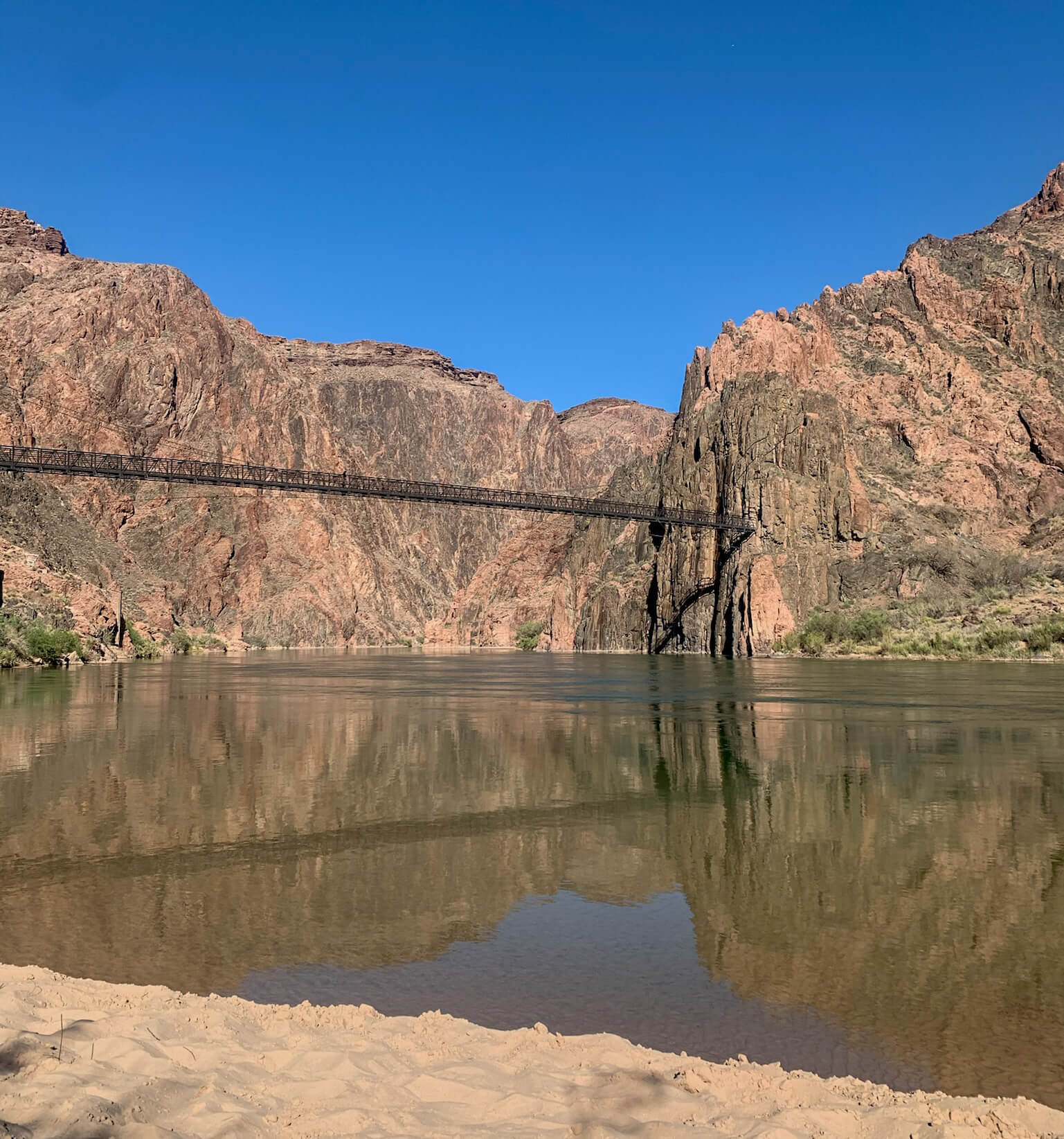 Black Bridge Over the Colorado River from Boat Beach in the Grand Canyon