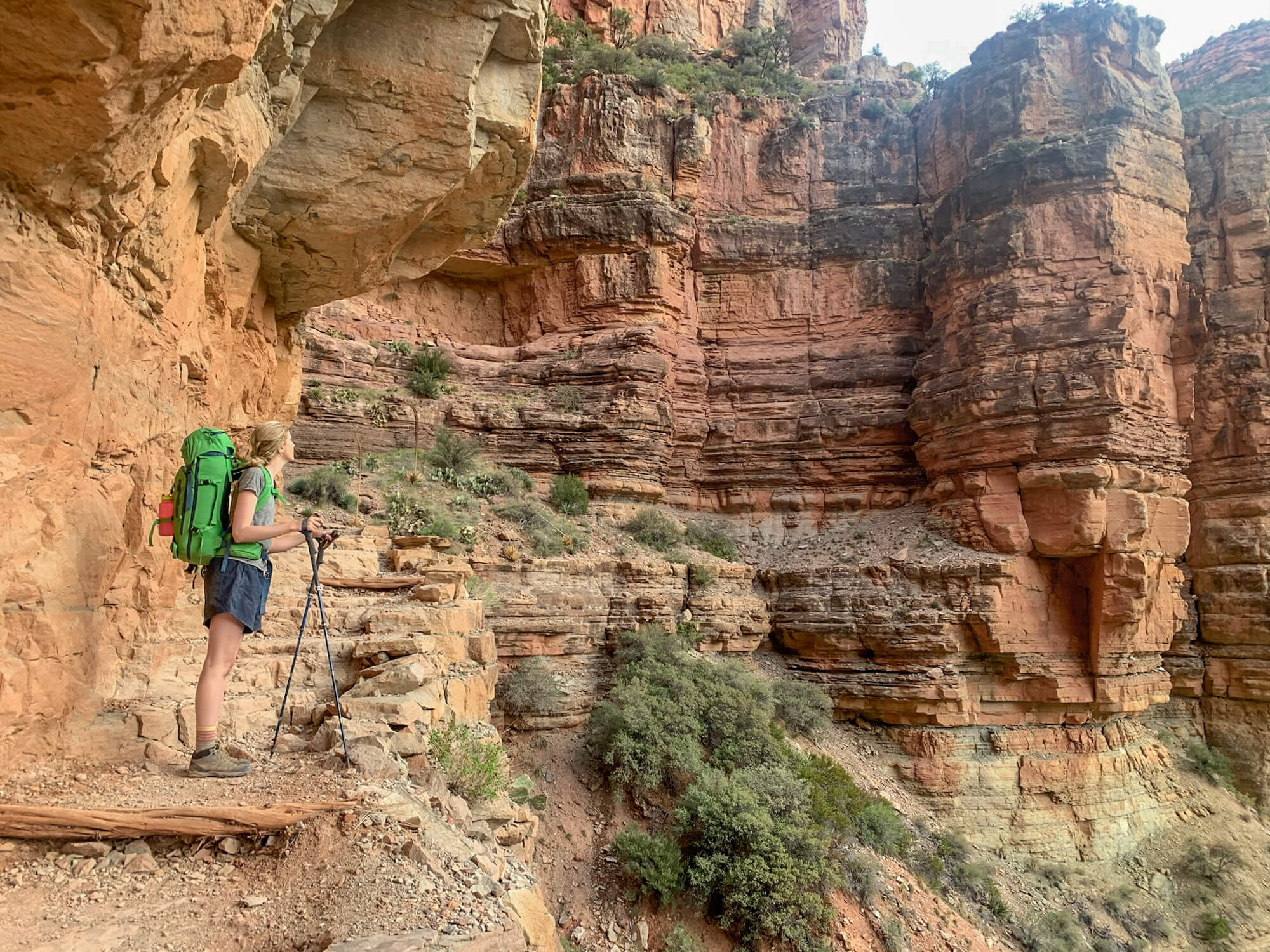 Hiker takes in a view on the North Kaibab Trail