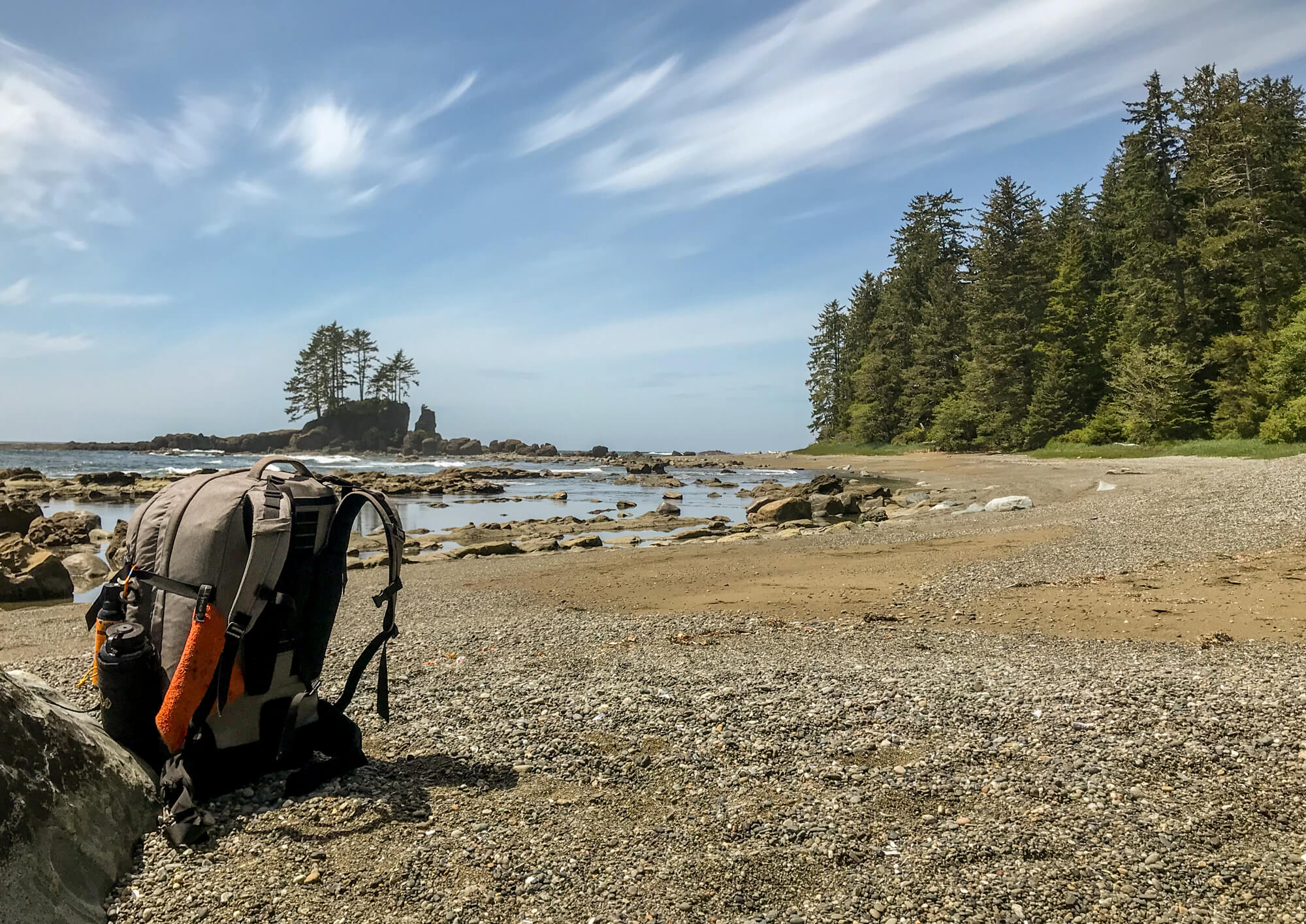 A backpack on a beach on the West Coast Trail